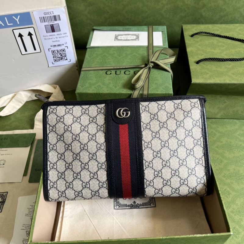 G*u*i clutch bags
